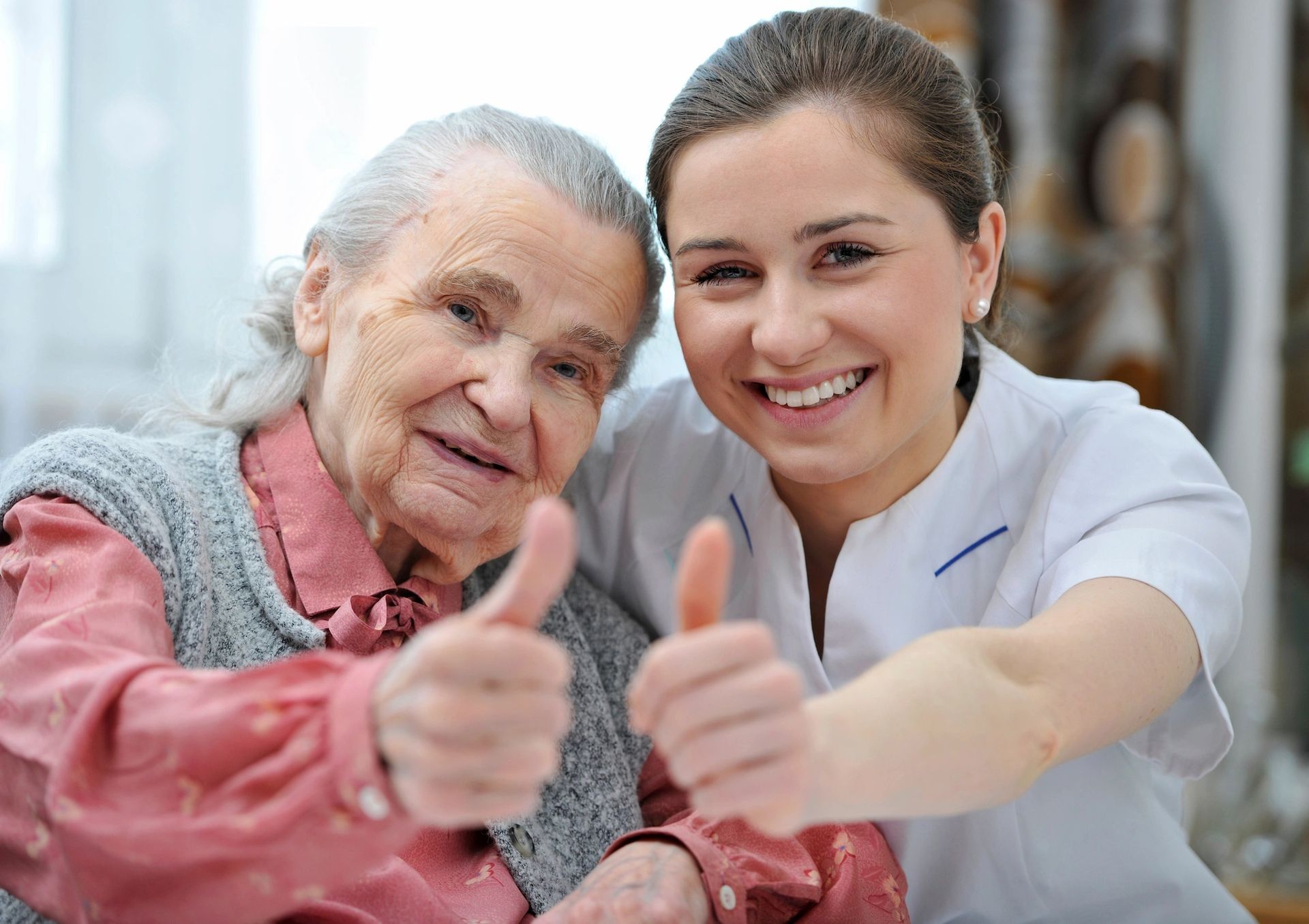 Thumbs up approval given by Mom and Senior Living Placement Referral Specialist